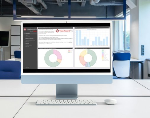 Shows computer screen with asset management software dashboard