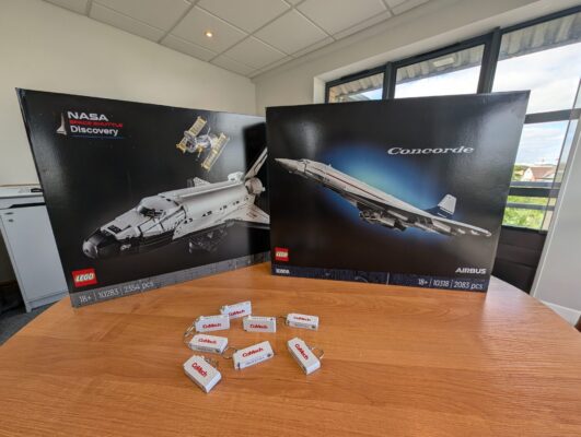 Image of lego boxes - space shuttle and concorde - on a table