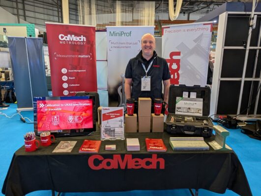 Man standing at exhibition table